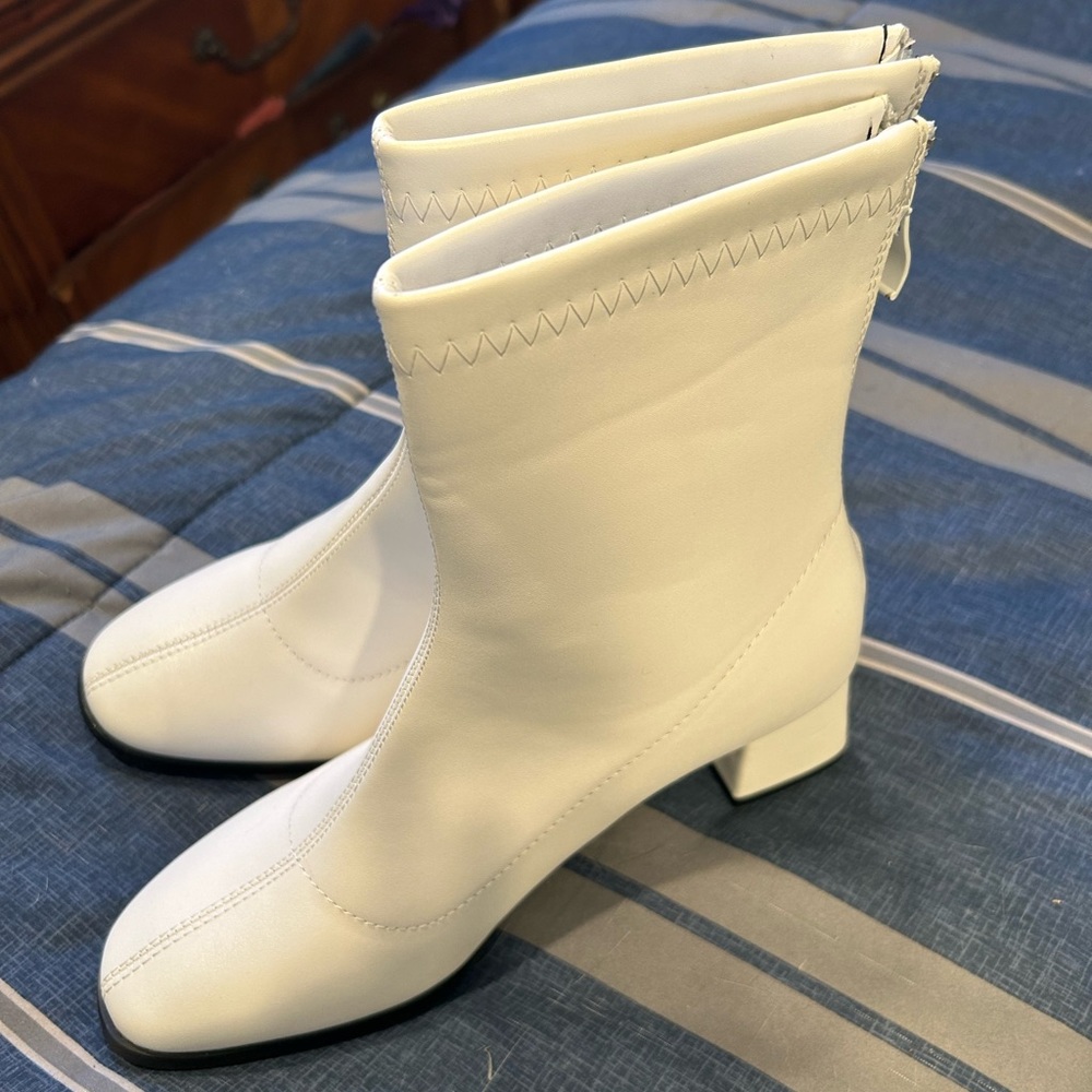 White Go go boots. Snakeskin espadrilles for $25.00 or, $10.00 a piece.